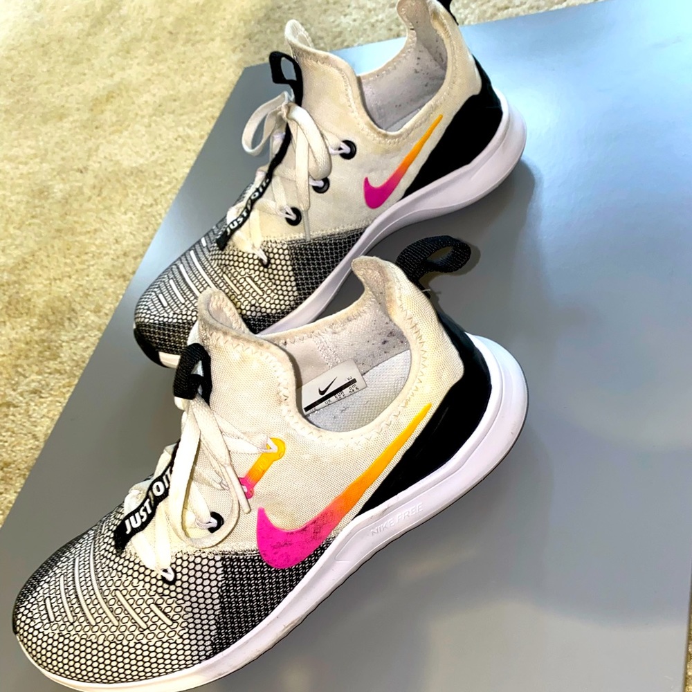 multi color Nike trainers size 7.5